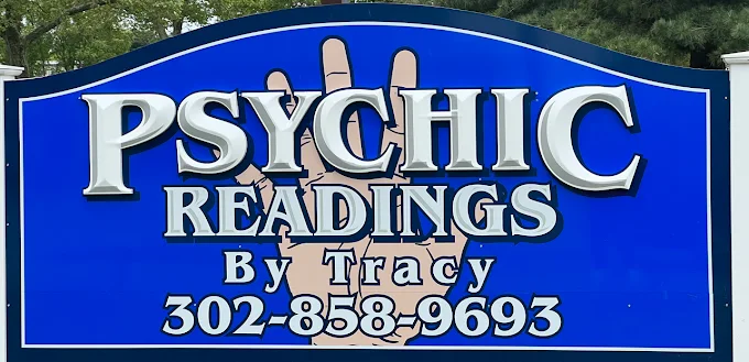 Psychic Readings by Tracy roadside sign in Harbeson, Delaware — call 302-858-9693